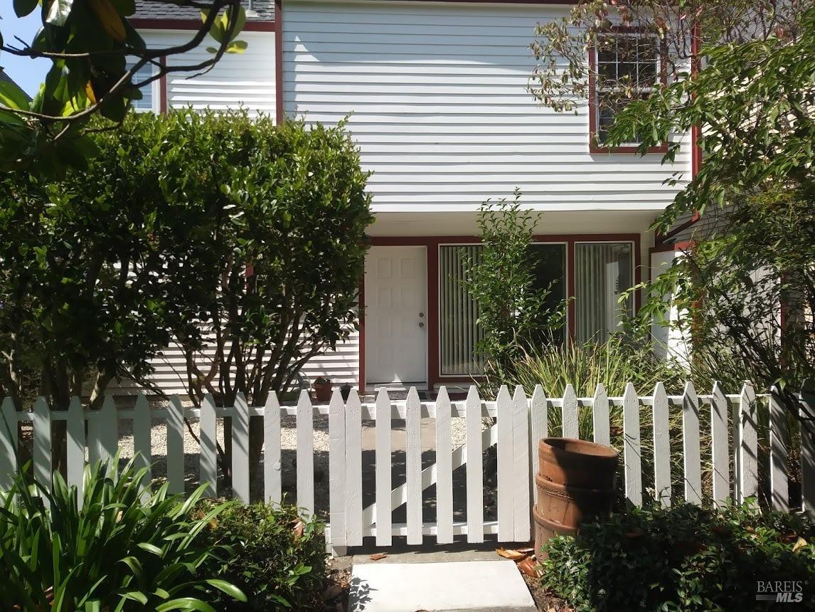 a view of a house with a garden