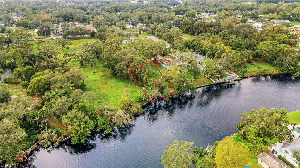 a view of a lake with a yard