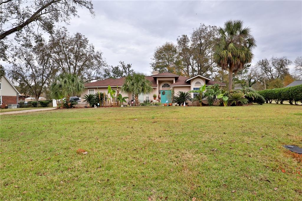 a front view of house with yard