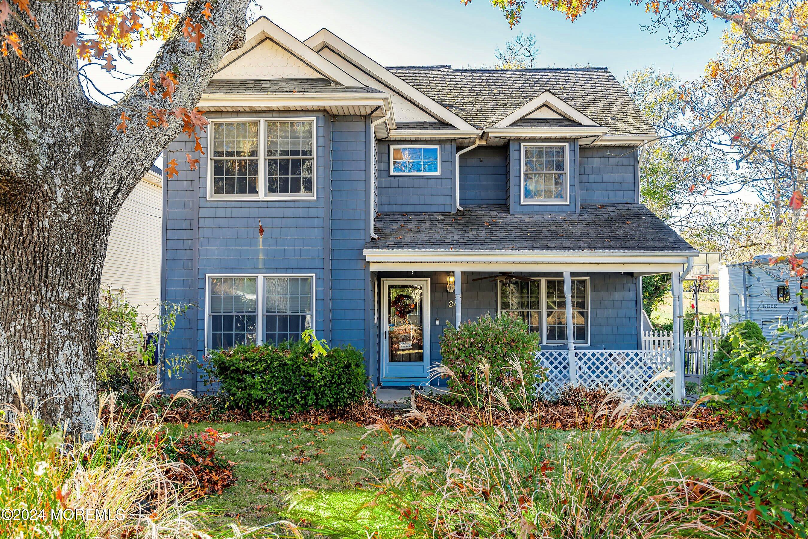 front view of a house with a yard