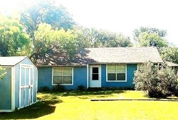 a view of a house with a patio