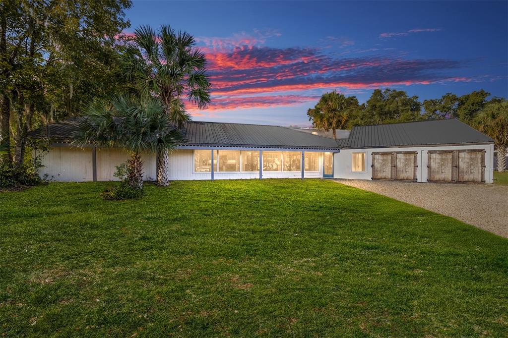 a view of a house with a big yard