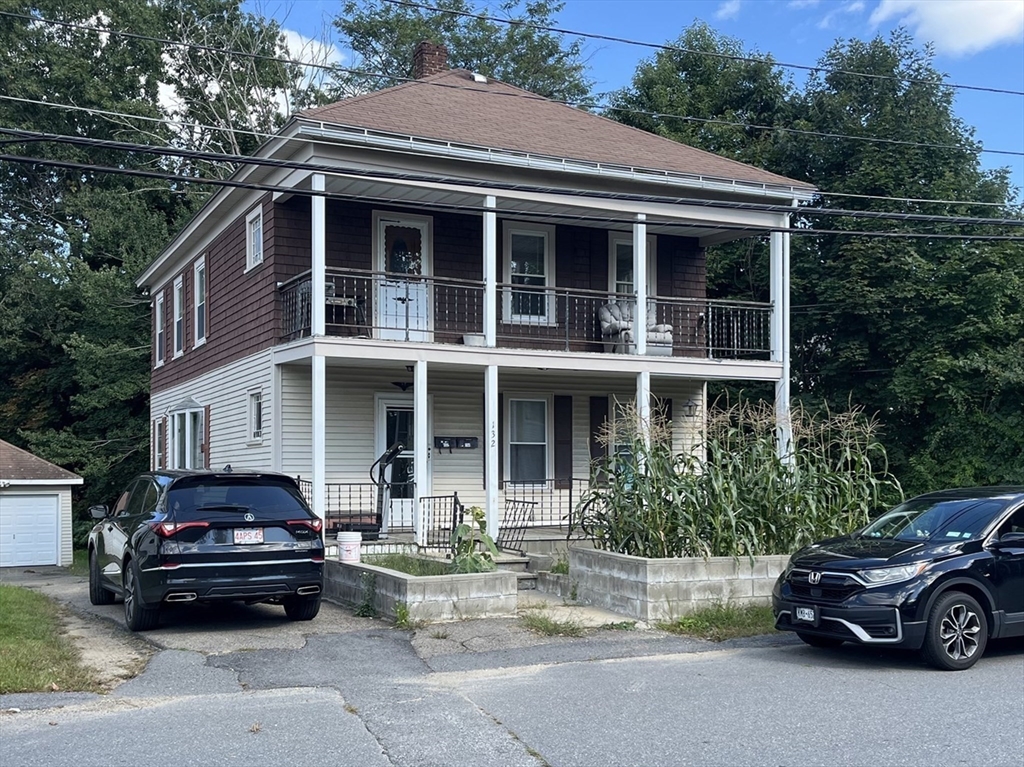 a car parked in front of a house