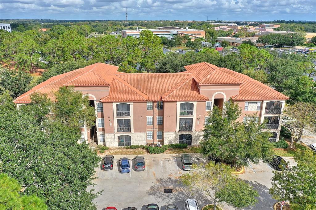 a aerial view of a house with a yard