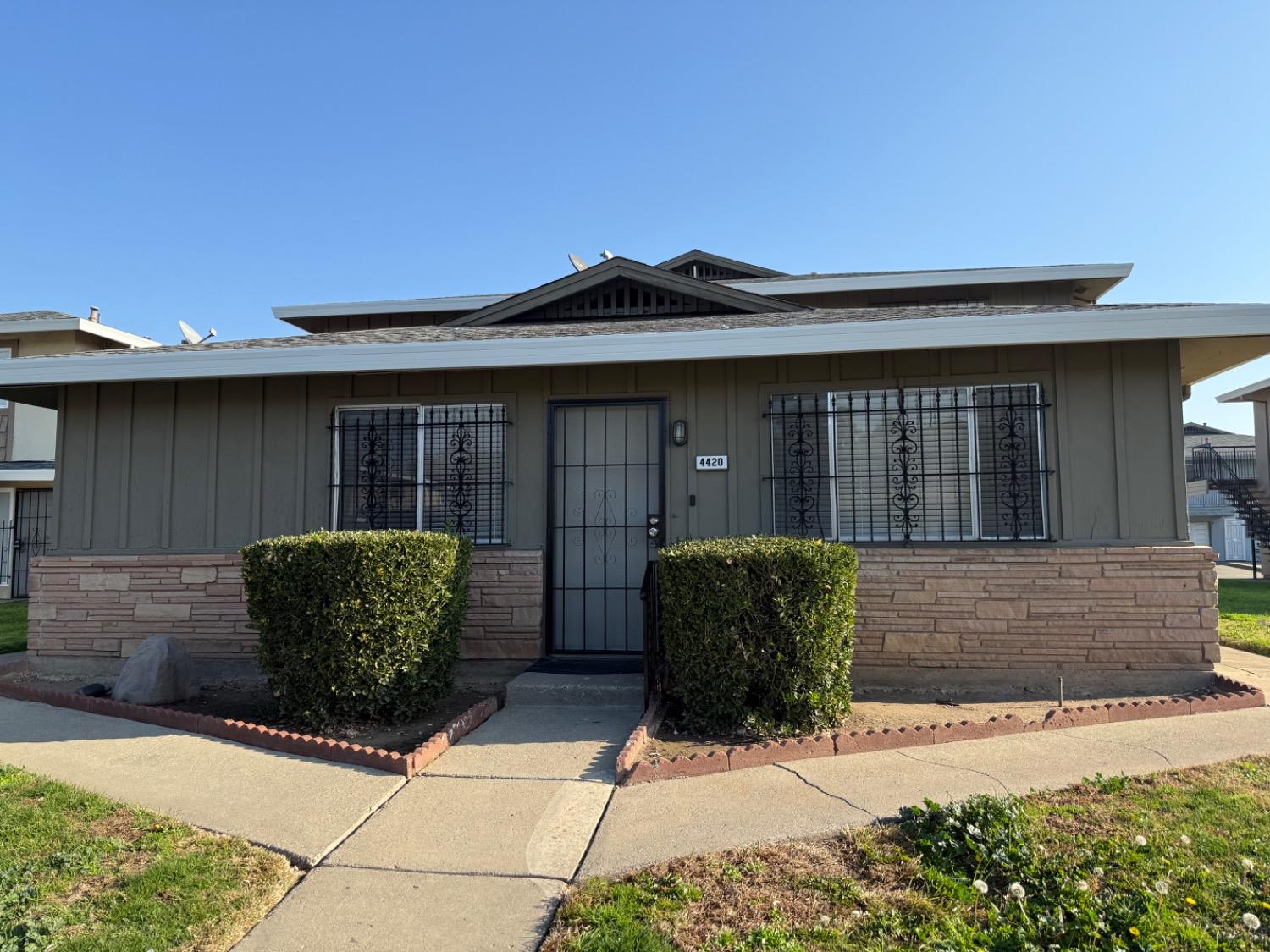 a front view of a house with garage