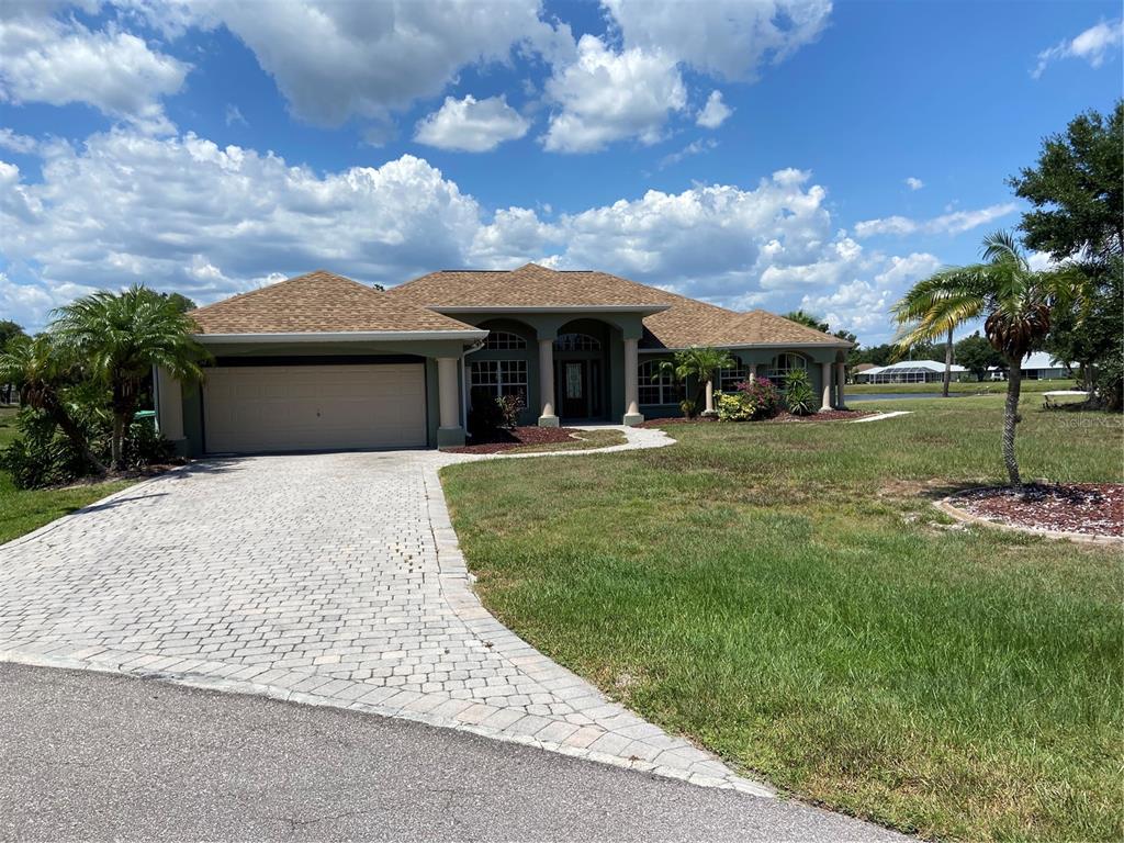 front view of a house with a yard