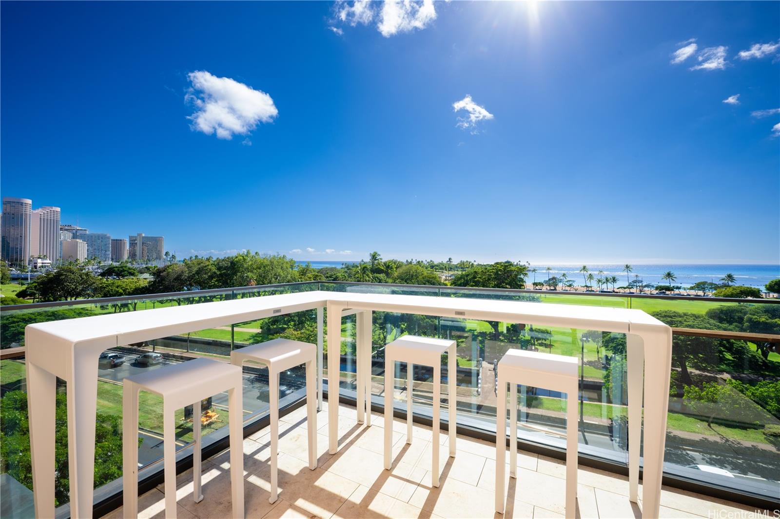 a view of balcony with furniture