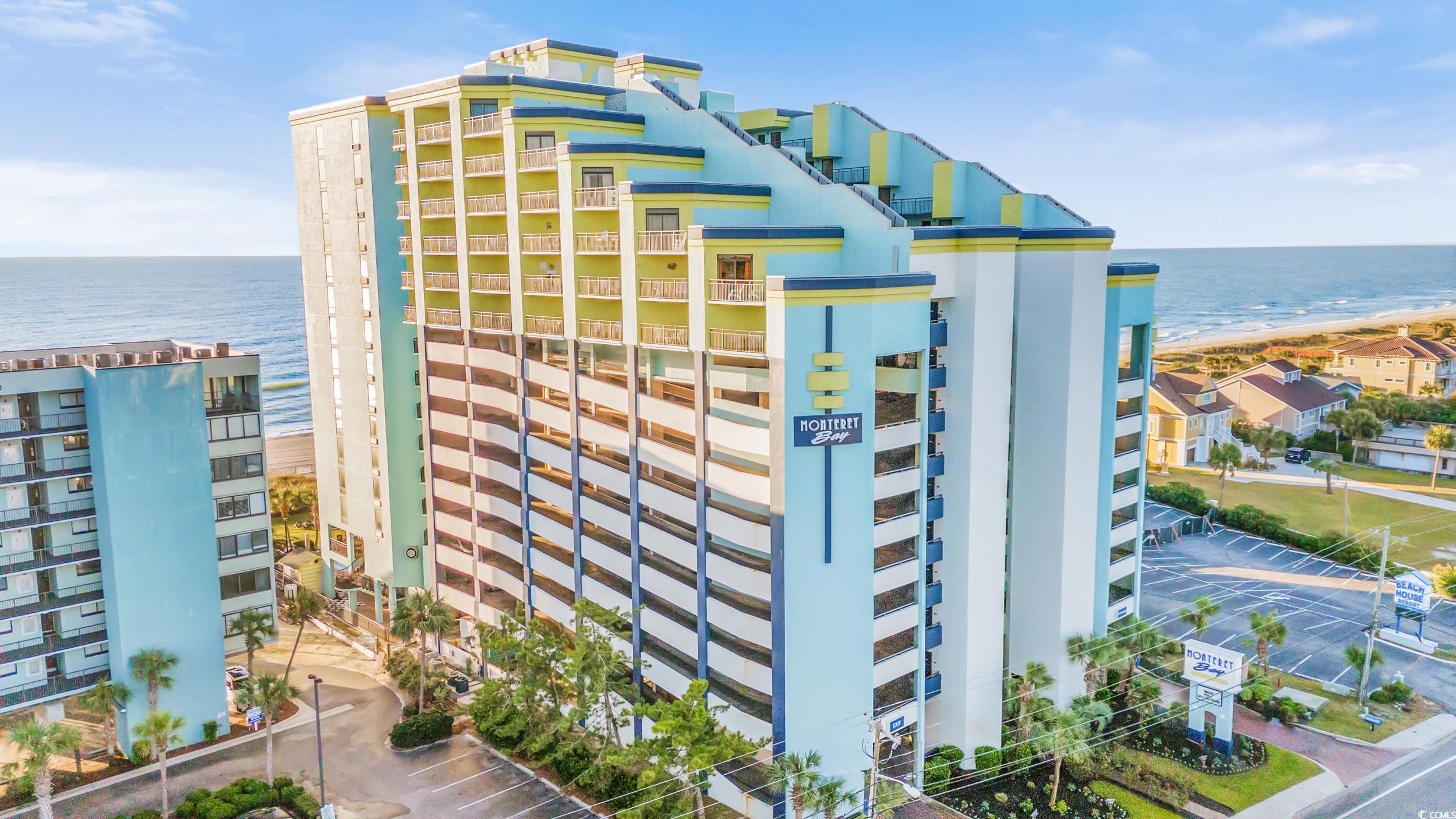 View of building exterior featuring a water view