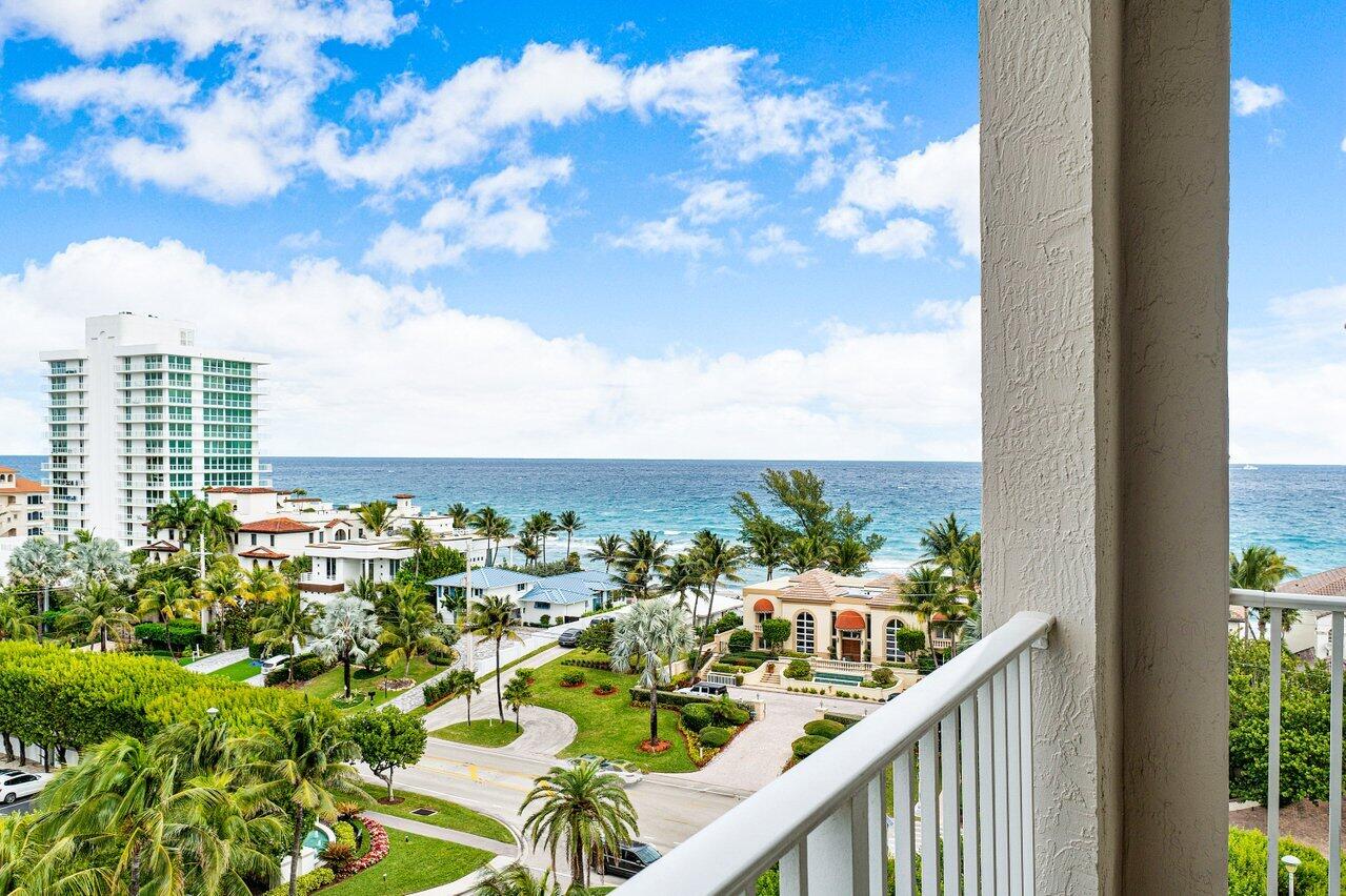 a view of a balcony with city view