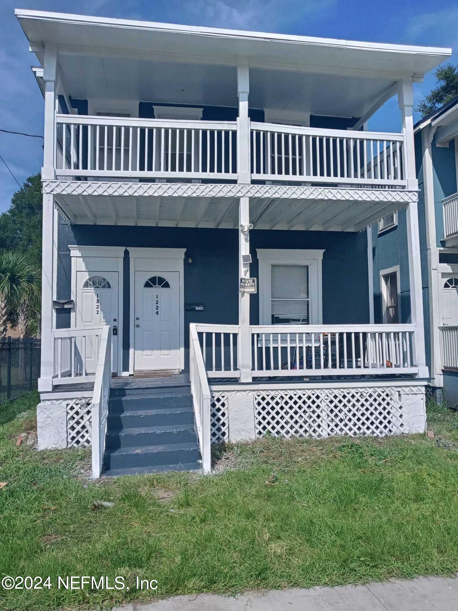 a view of a house with a deck