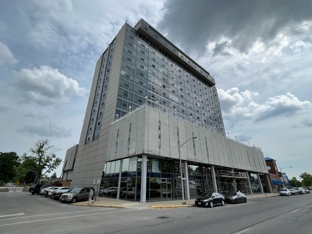 a front view of a building with street