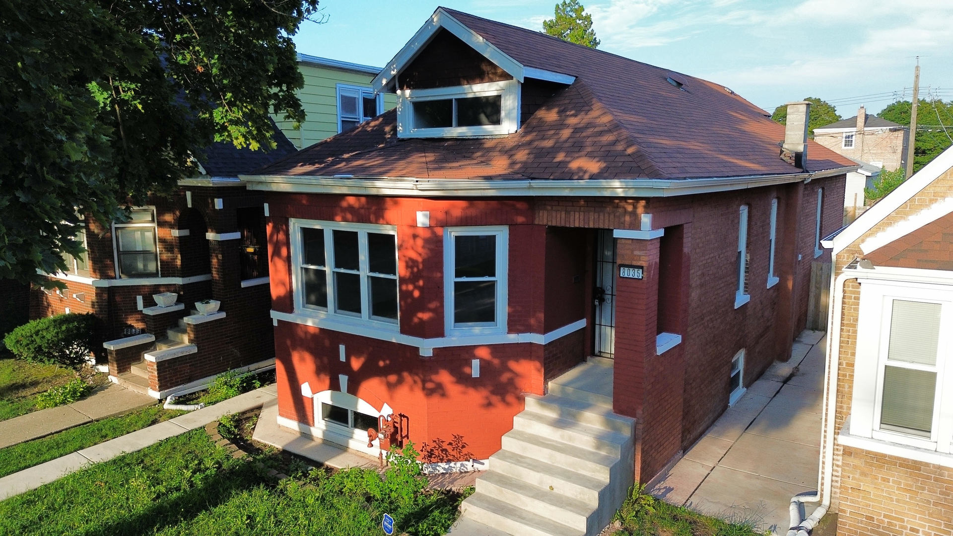 front view of house with a yard