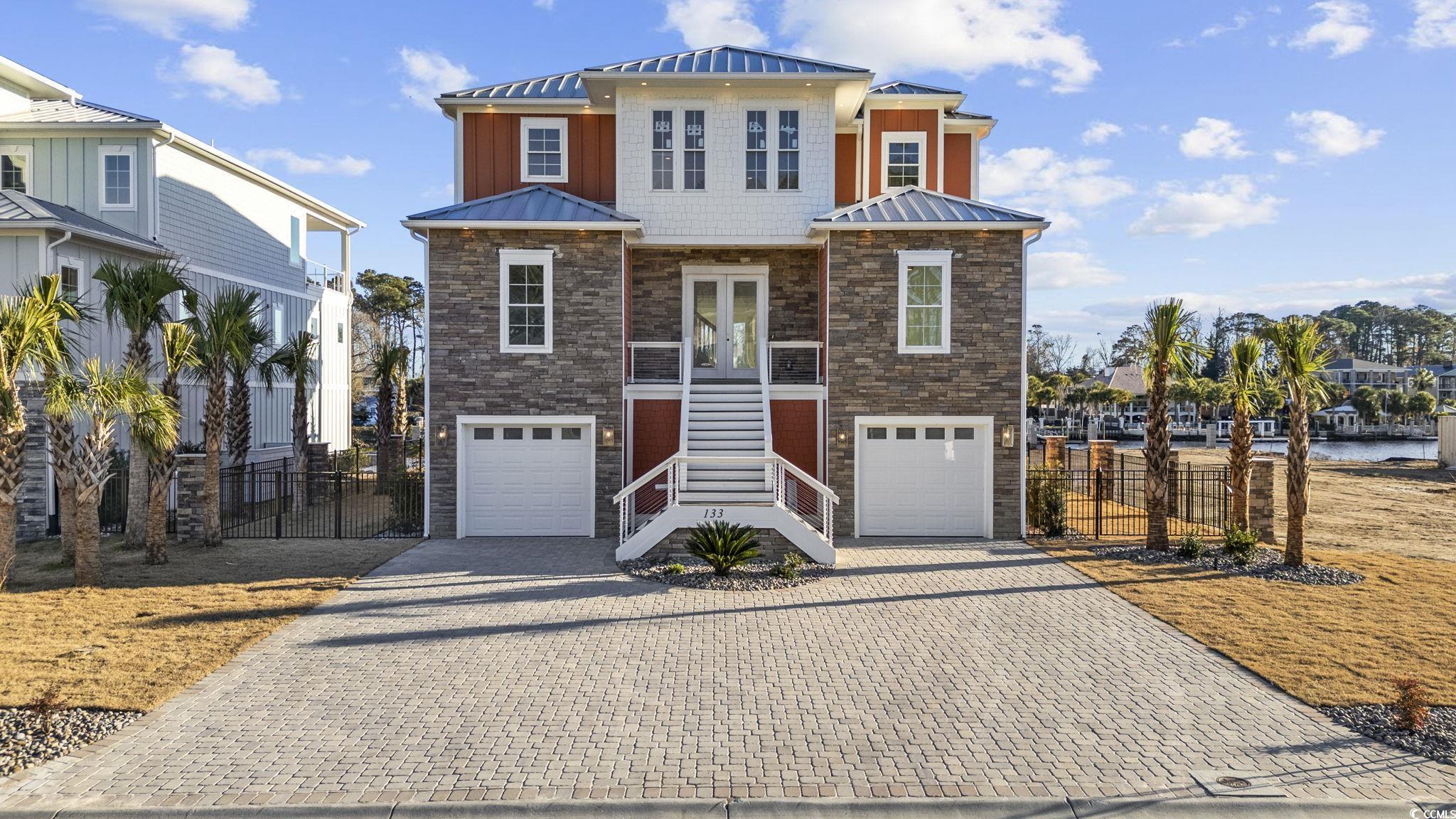 View of front of house with a garage