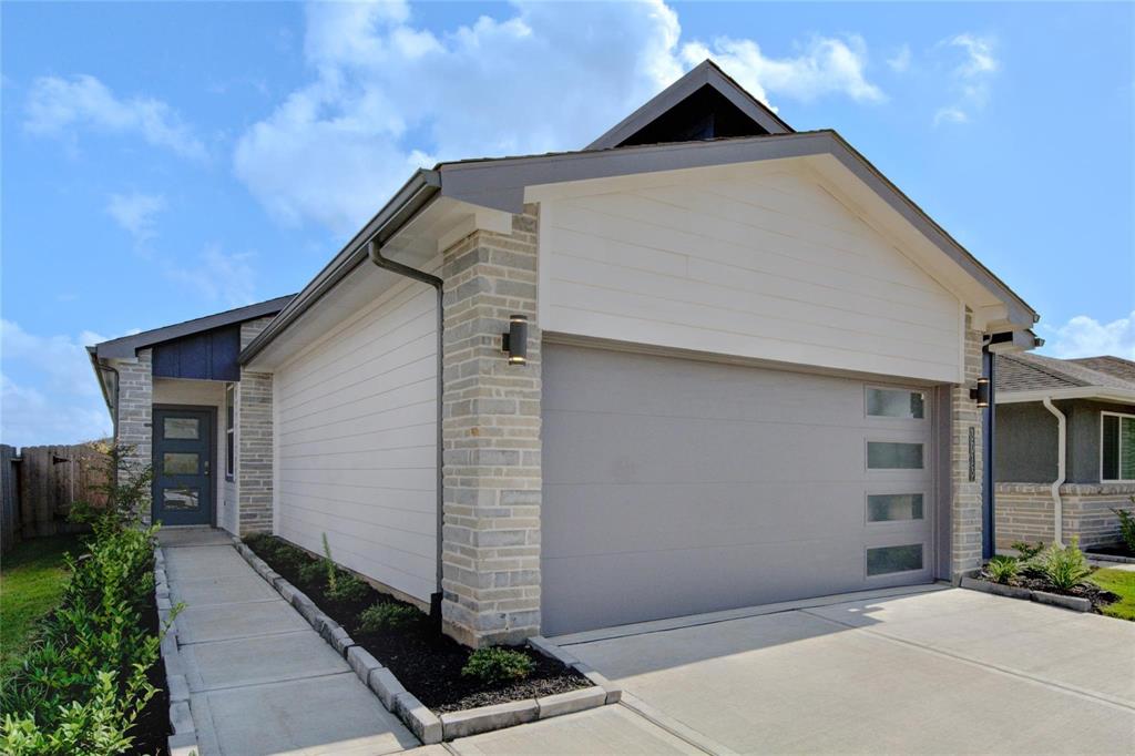 a view of a house with garage