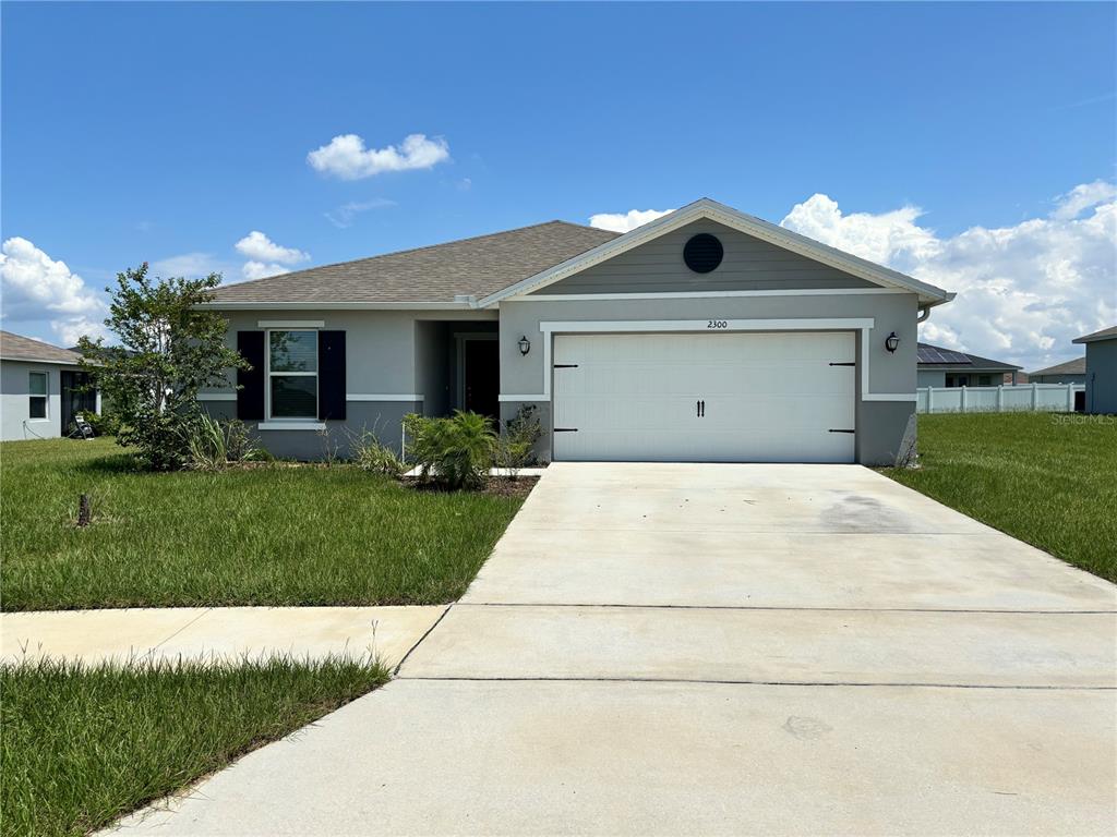 a front view of house with yard