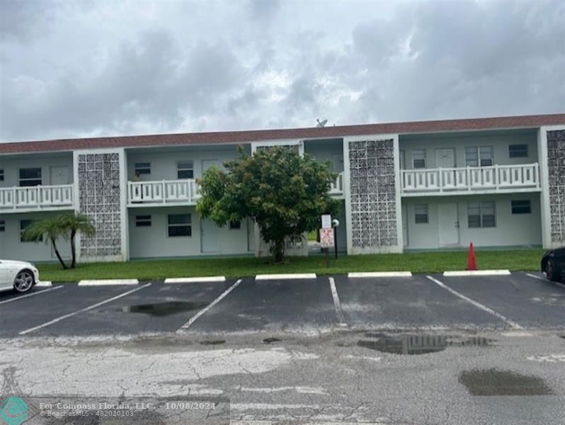 a front view of a building with street