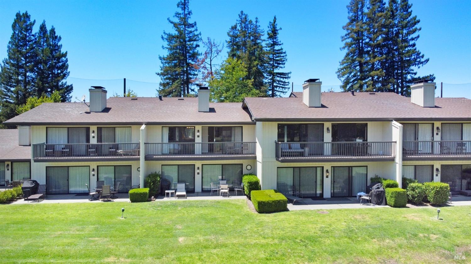 a view of an outdoor space yard and front view of a building