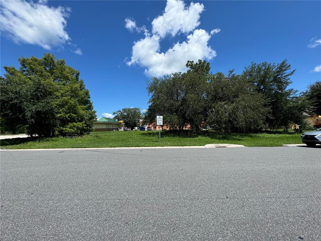 a view of a house with a big yard