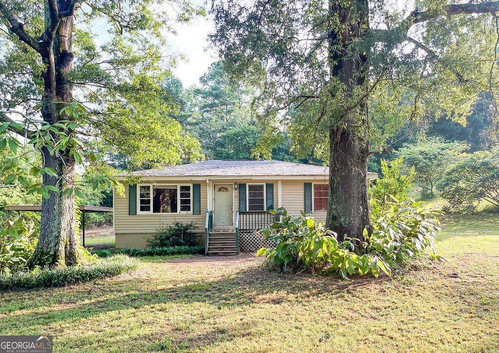 front view of a house with a yard