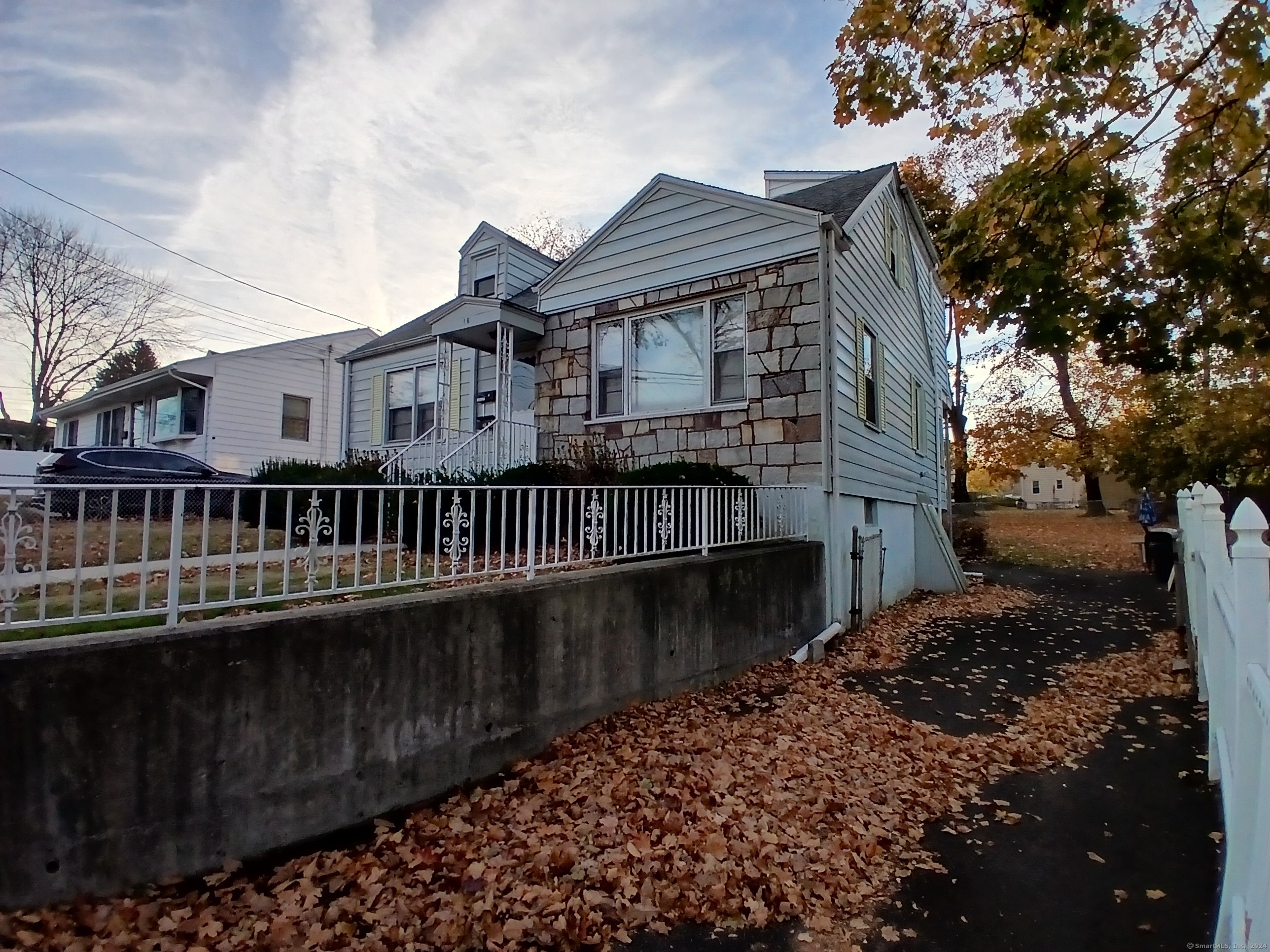 a view of a house with a roof deck