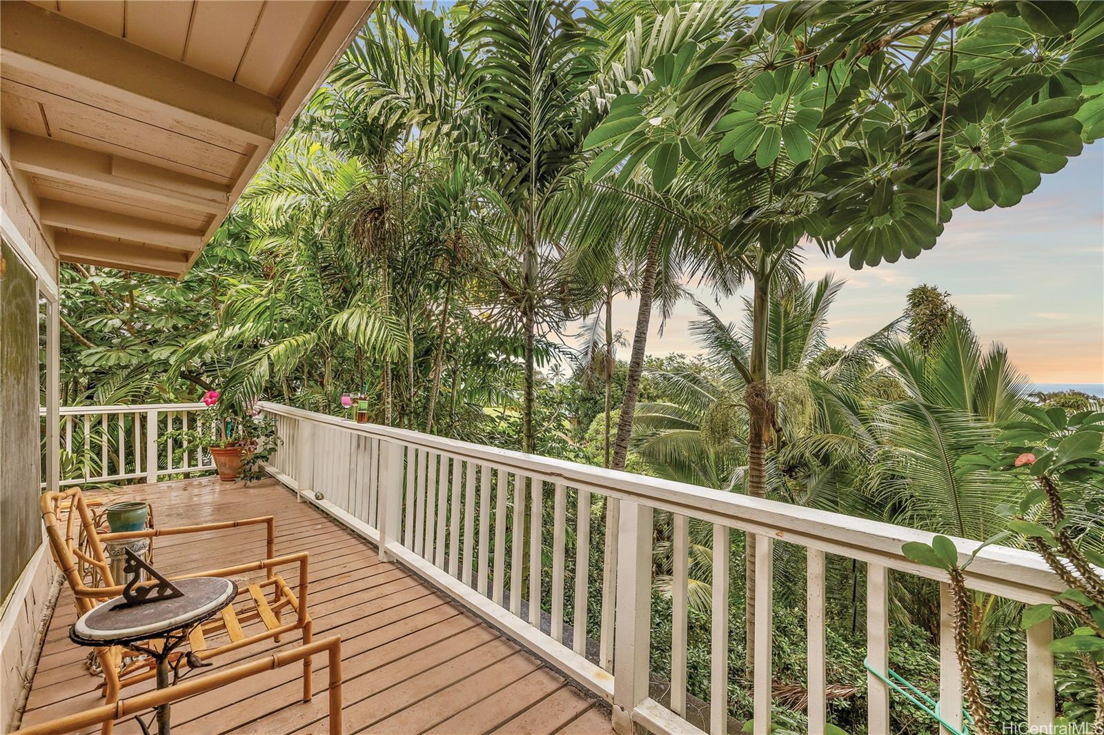 a view of balcony with furniture