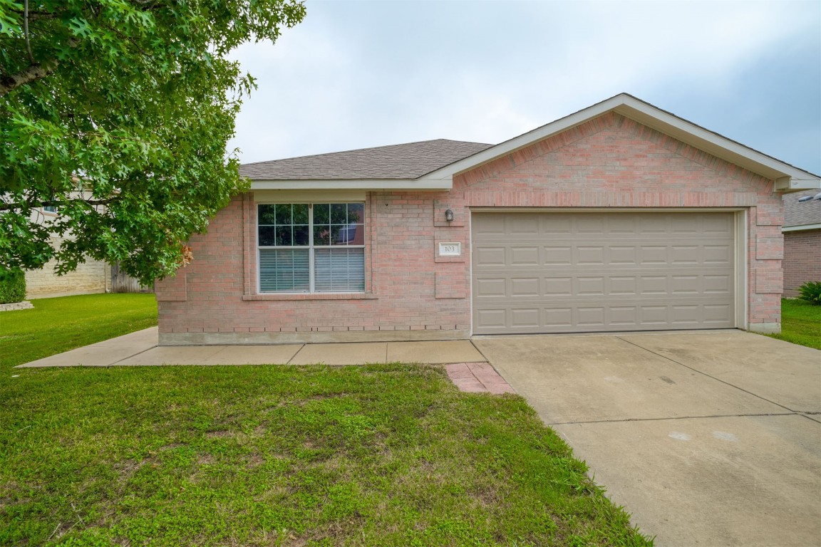 front view of house with a yard