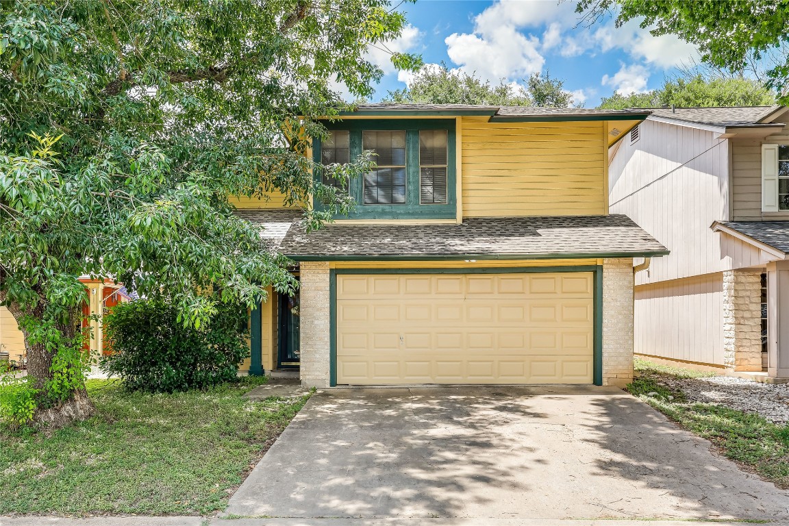 a front view of house with yard