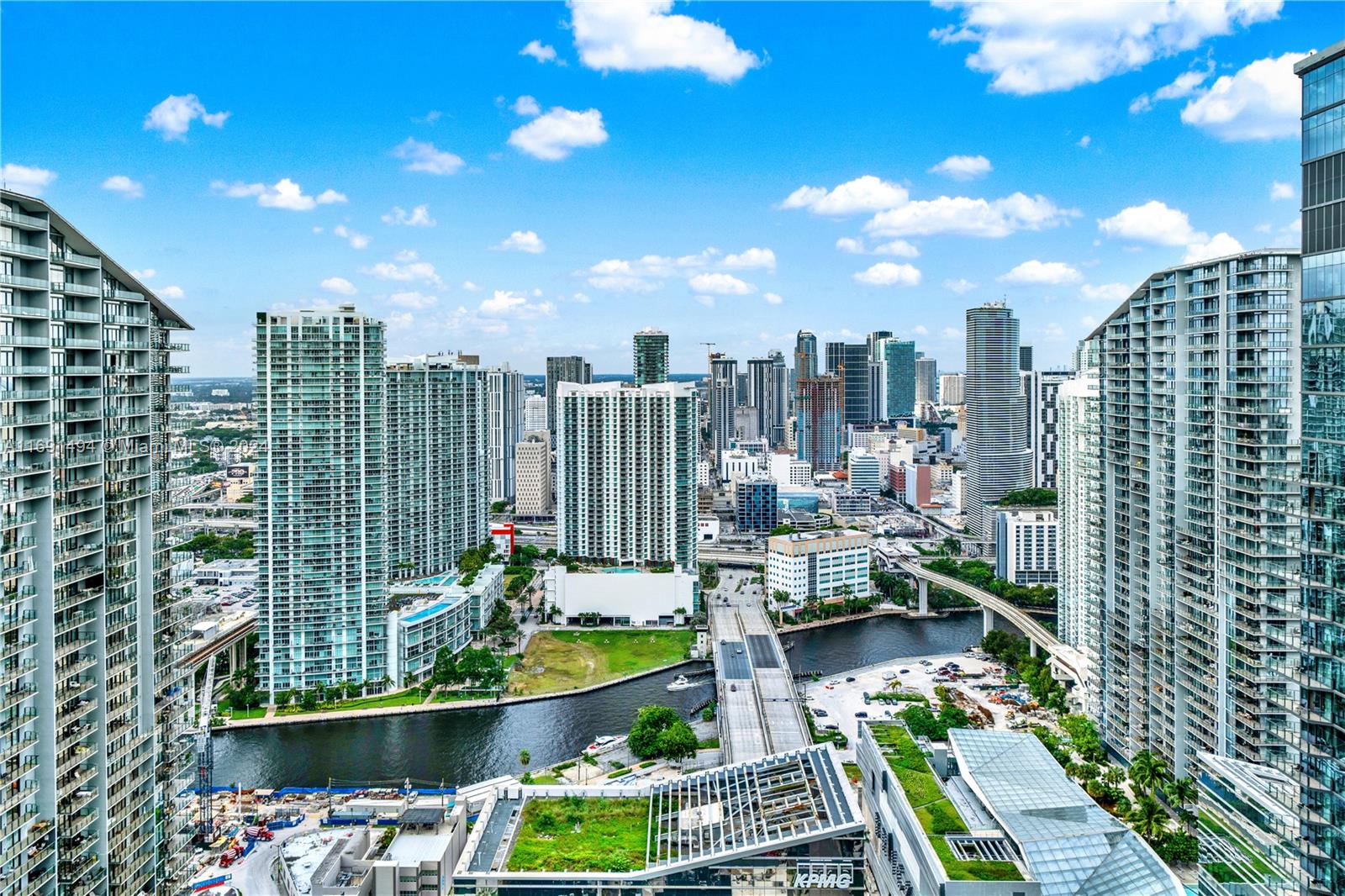 a view of a city with tall buildings