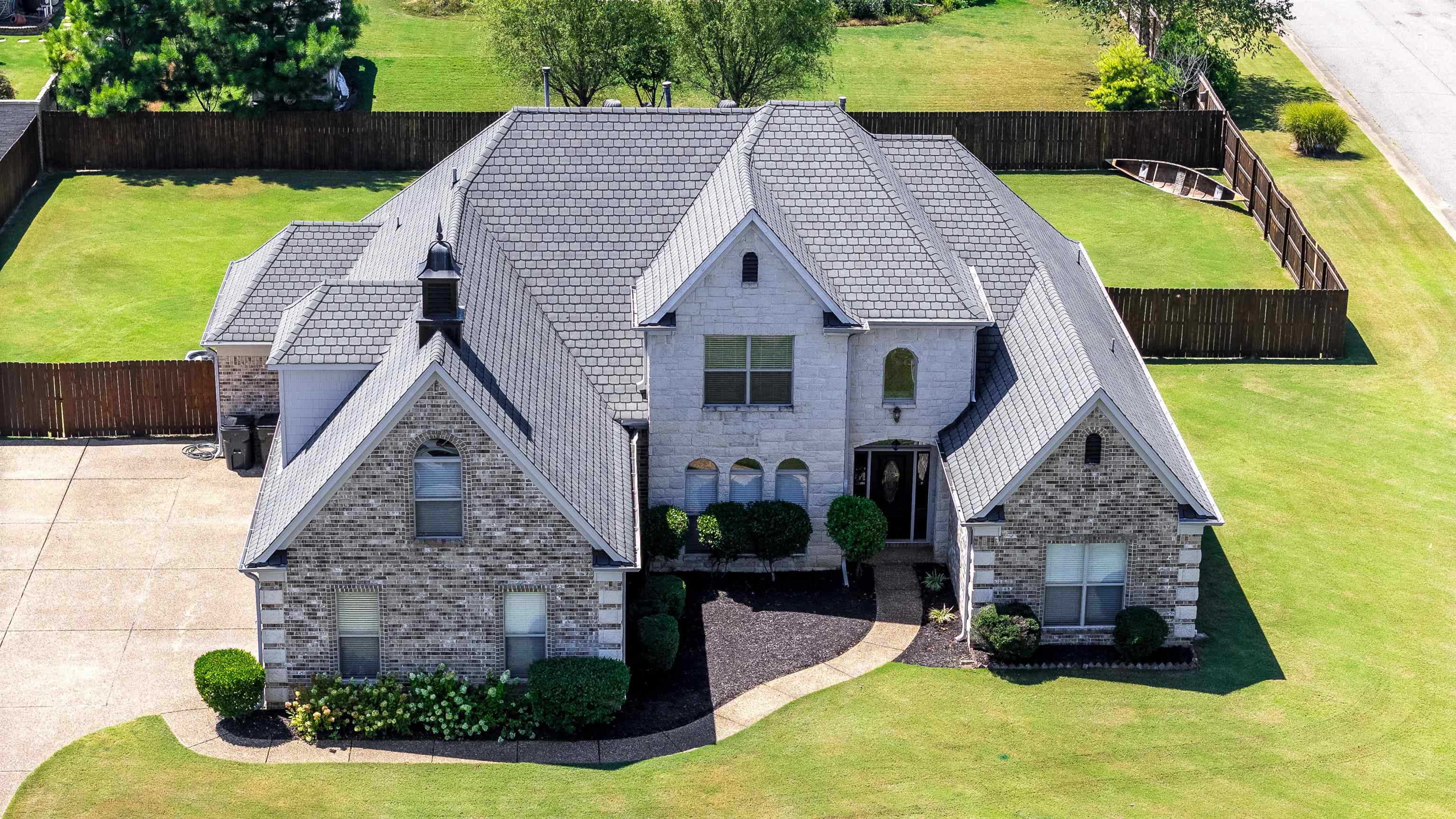 a aerial view of a house with swimming pool