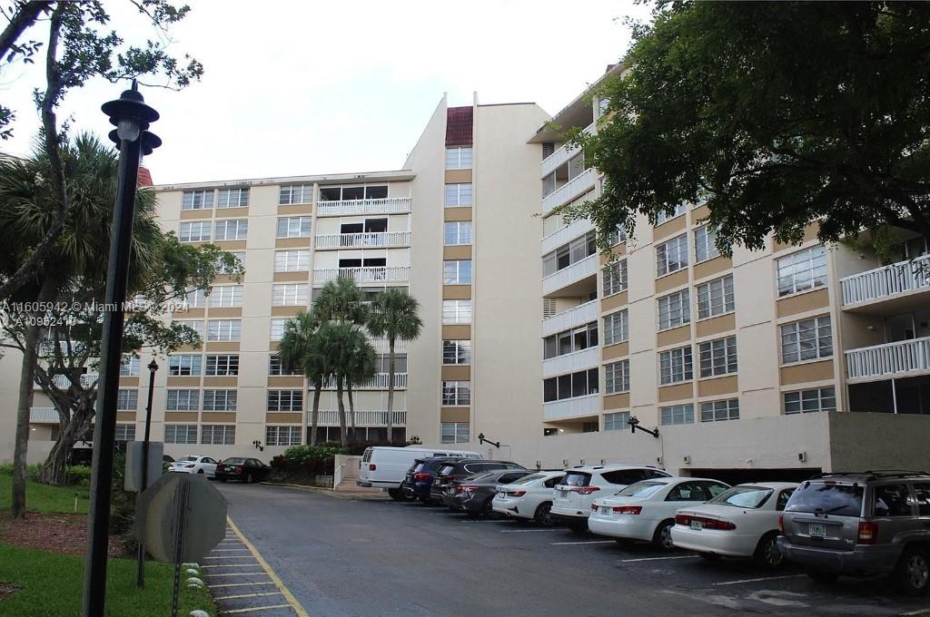 a cars parked in front of a building