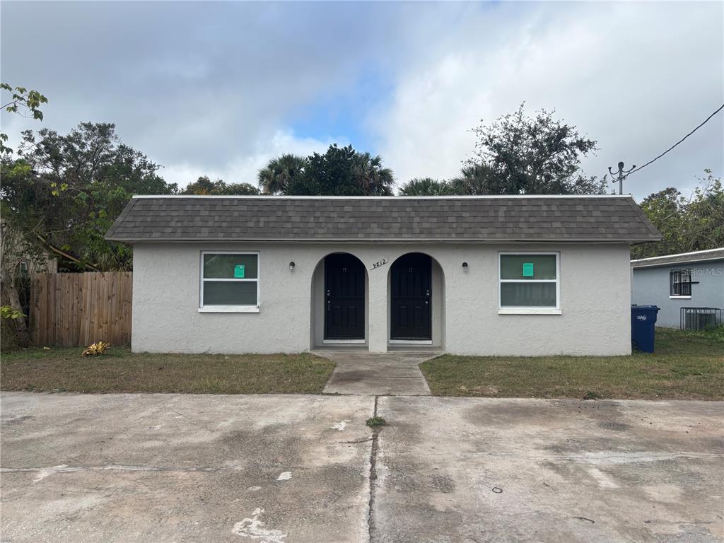 a front view of a house with a garage