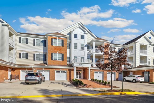 $500,000 | 15211 Royal Crest Drive, Unit 406 | The Greenbrier Condominiums