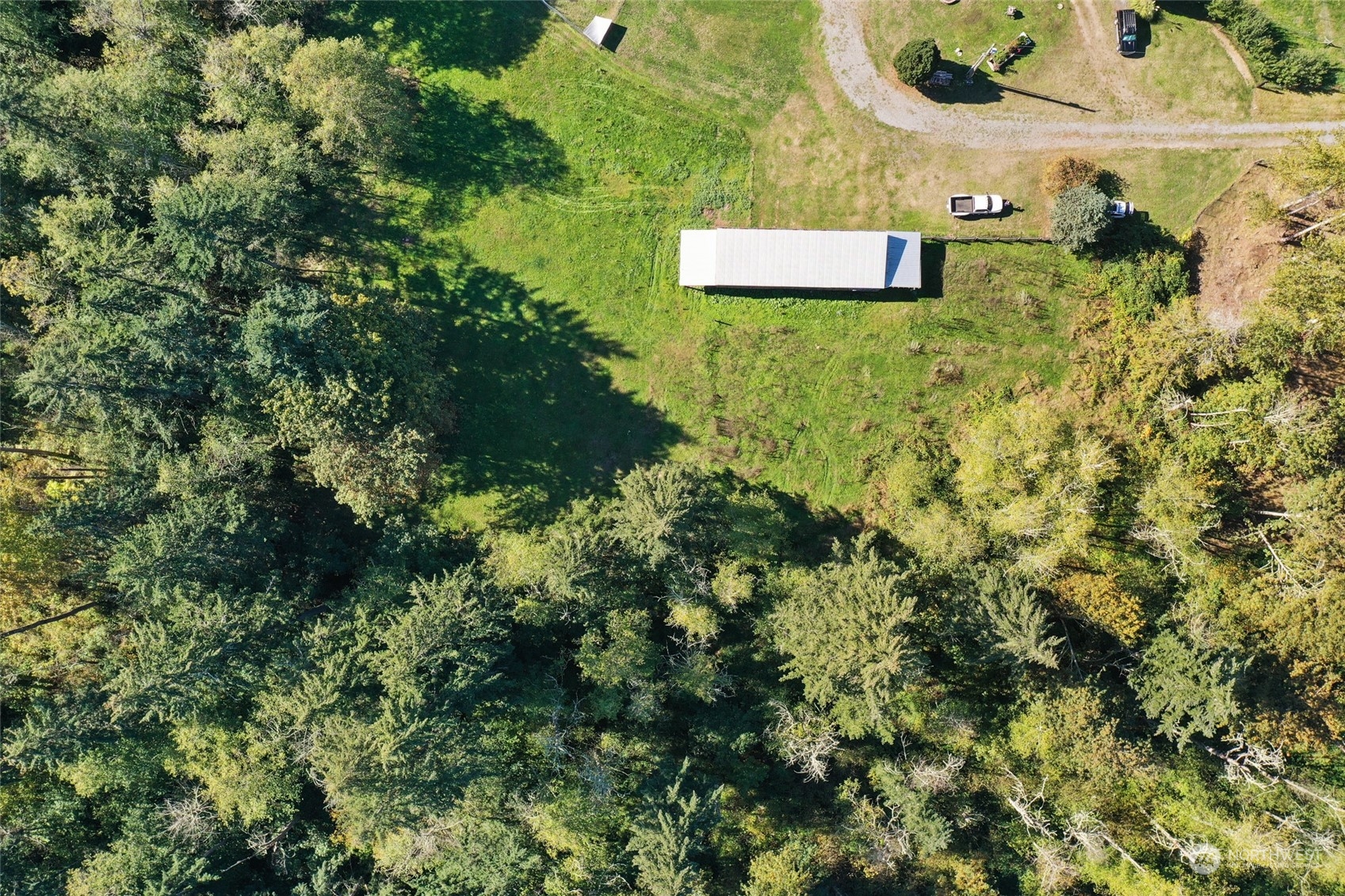 an aerial view of residential house with outdoor space