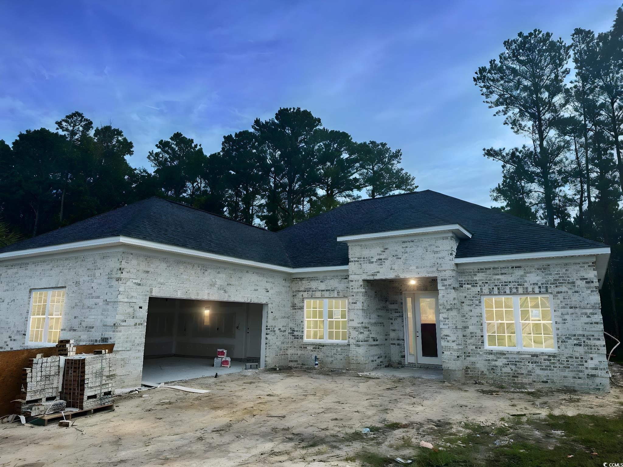 View of front of property with a patio