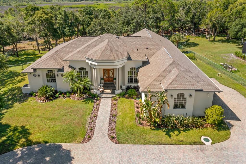 front view of a house with a yard