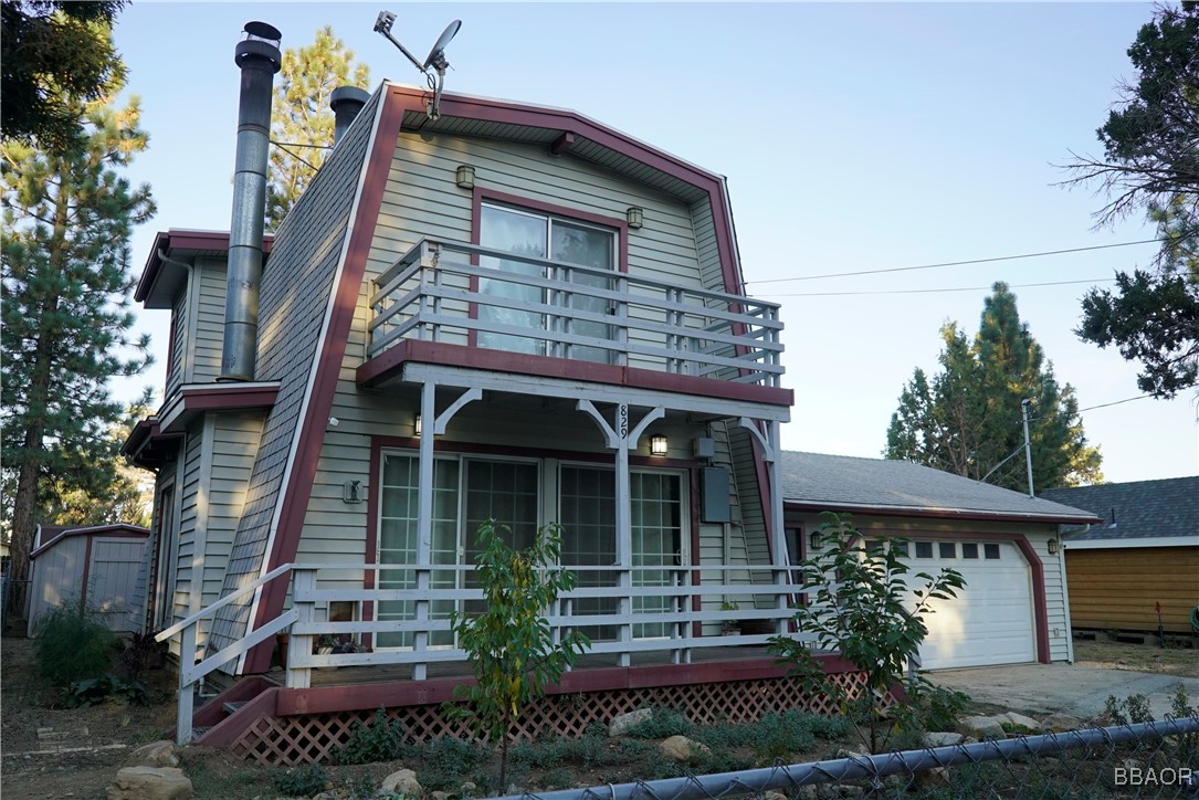 front view of a house with a small yard