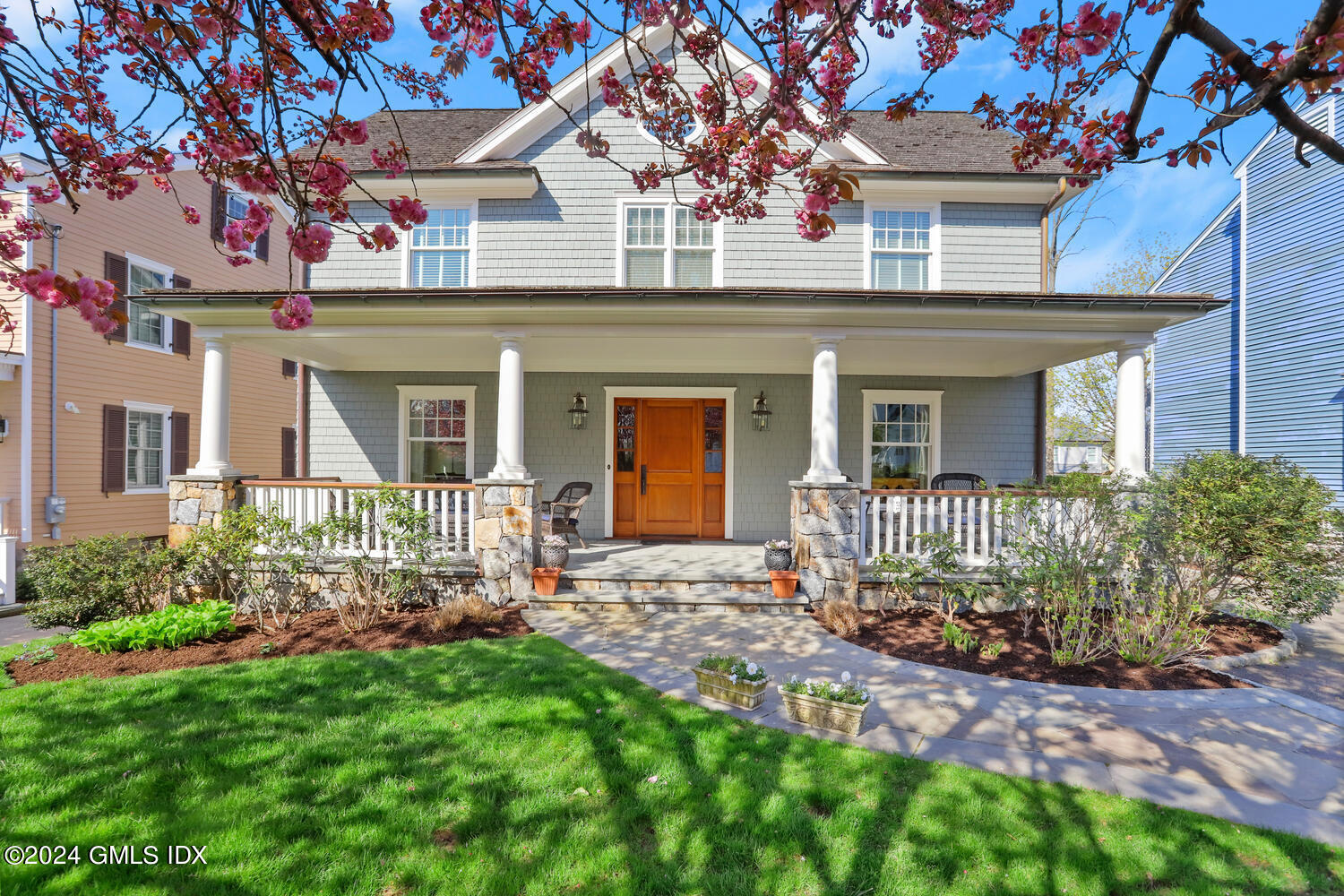 front view of a house with a yard