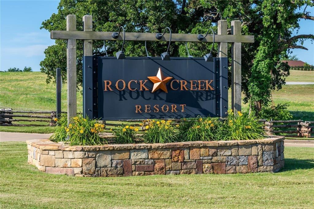 a view of a sign board with a big yard