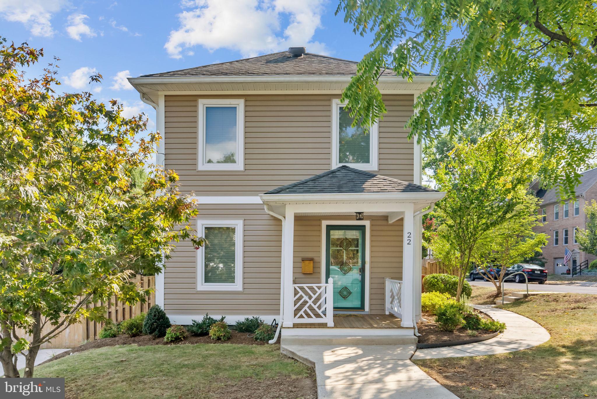 front view of a house with a yard