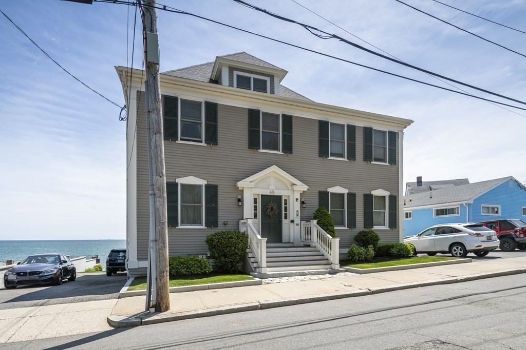 a front view of a house with a porch