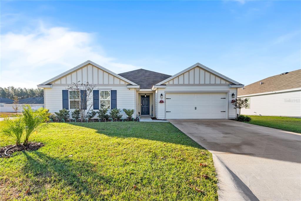 front view of a house with a yard