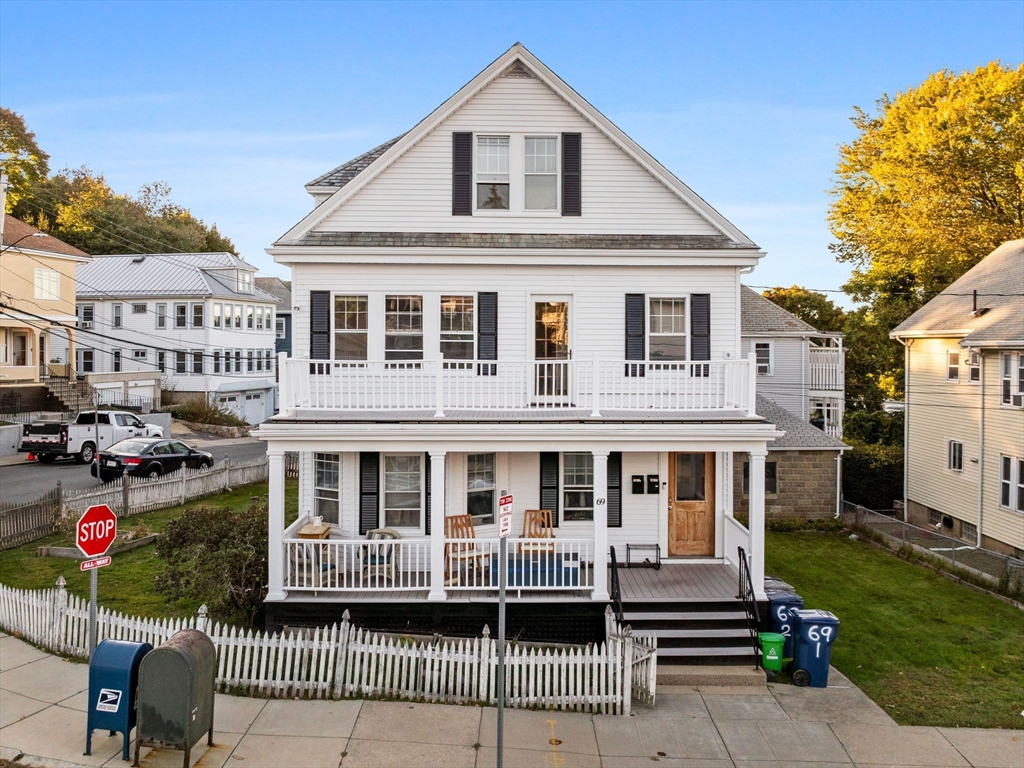 a front view of a house with a porch