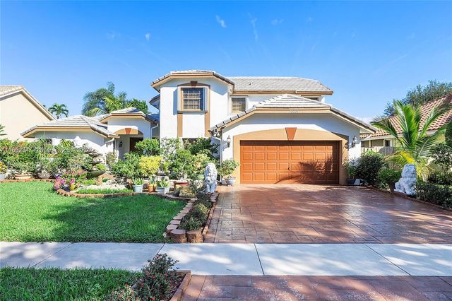 $825,000 | 10401 Northwest 18th Place | Jacaranda