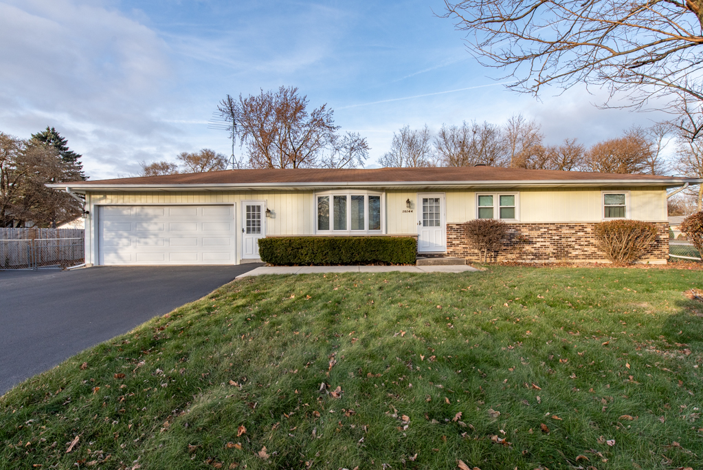 front view of house with a yard