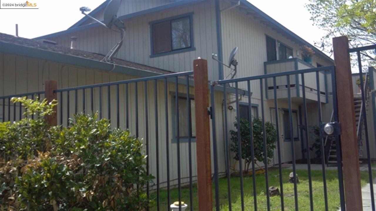 a view of a house with a flower plants