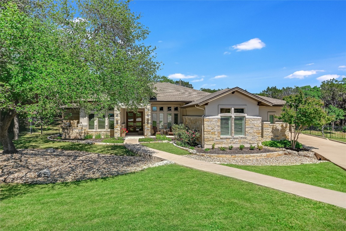 a front of a house with a yard