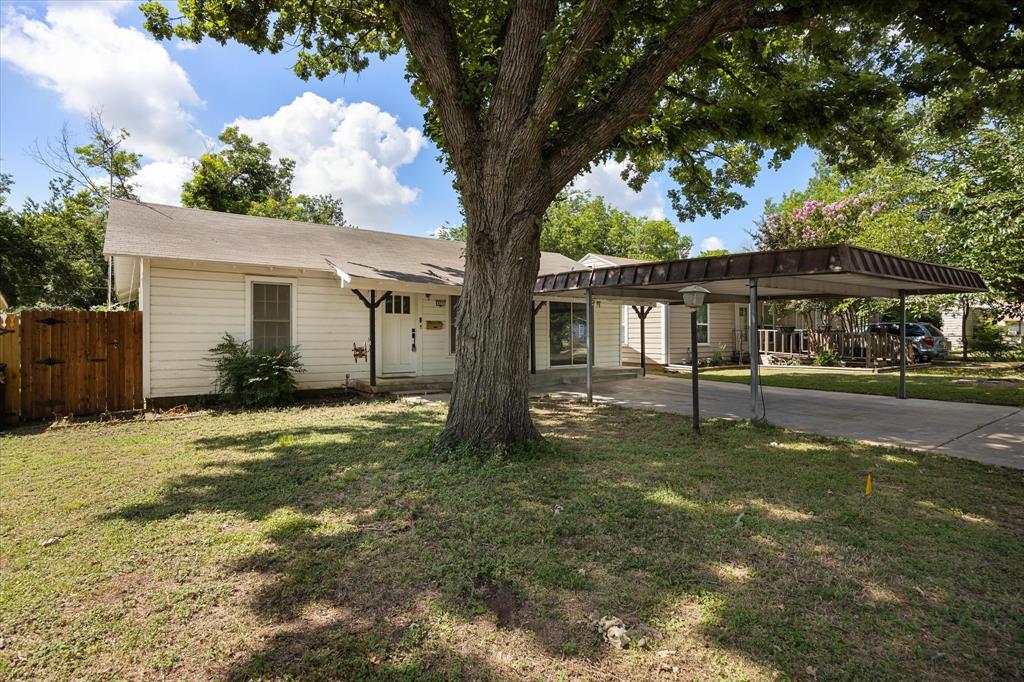 a house with trees in the background