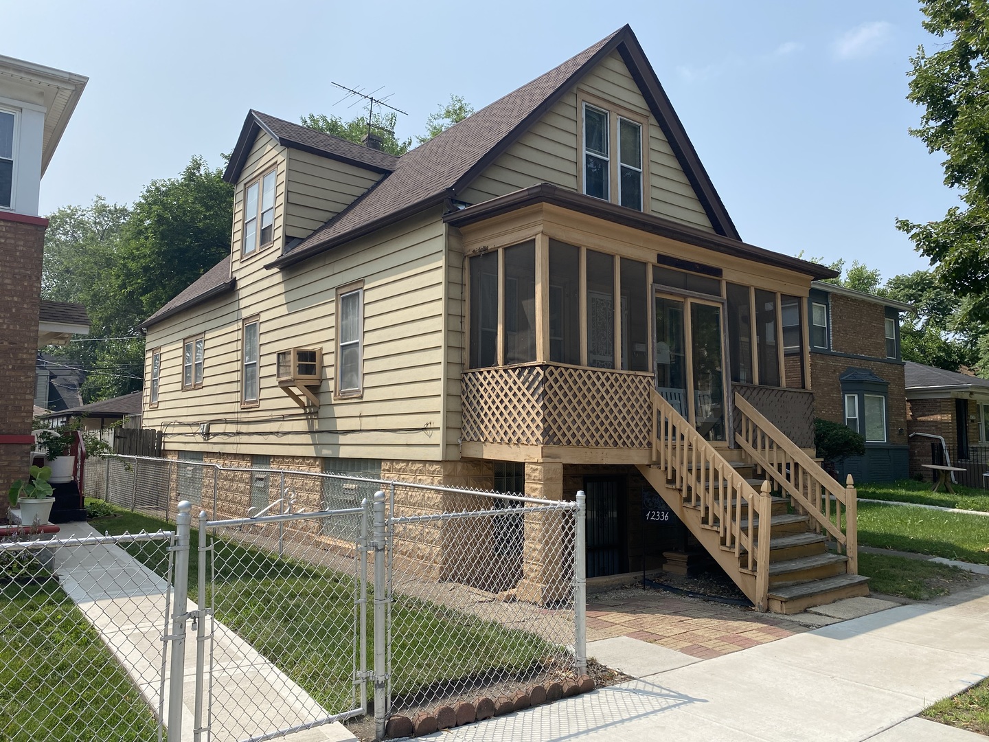 a front view of a house with a balcony