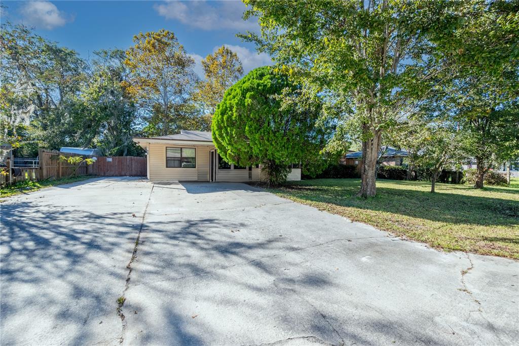 a house with trees in front of it