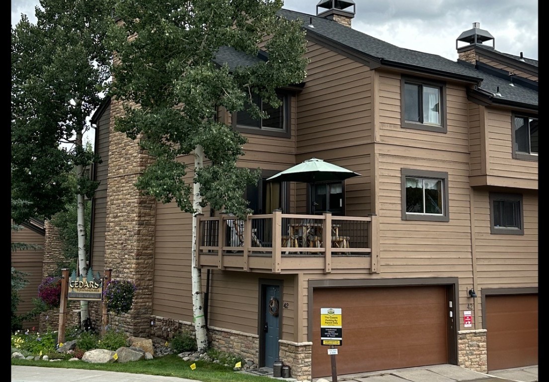 View of front of home with a balcony